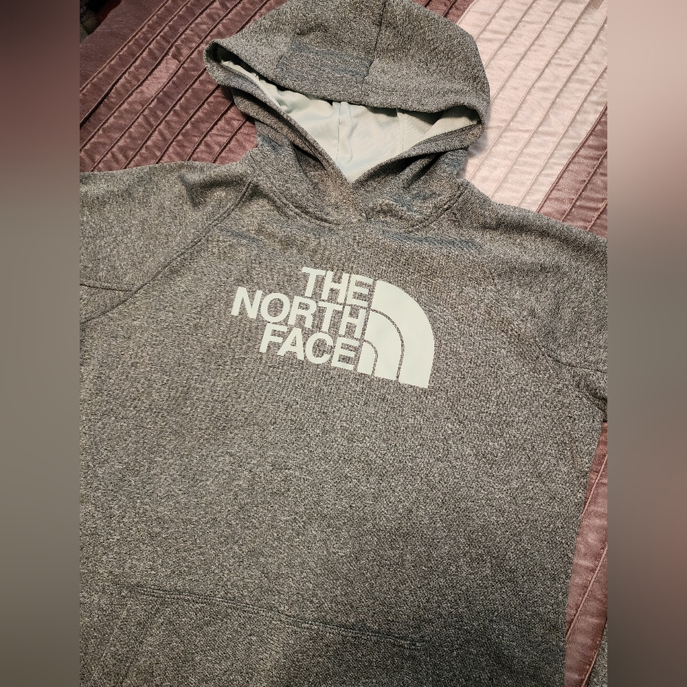 The North Face Woman's hoodie with front pocket.